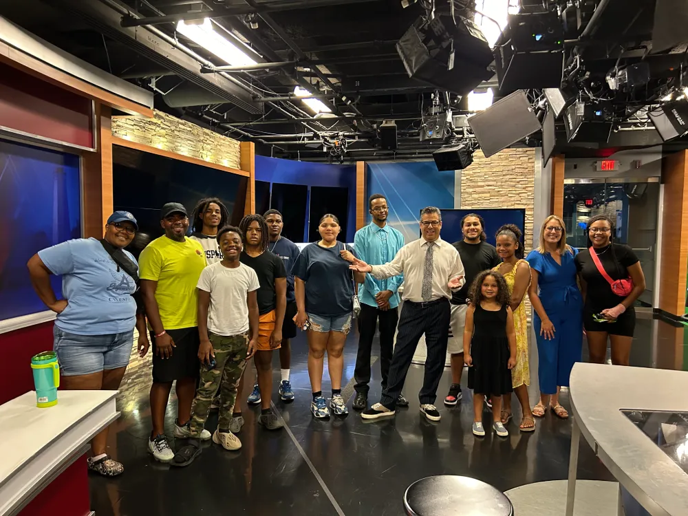 Team of volunteers setting up a community event to support local families